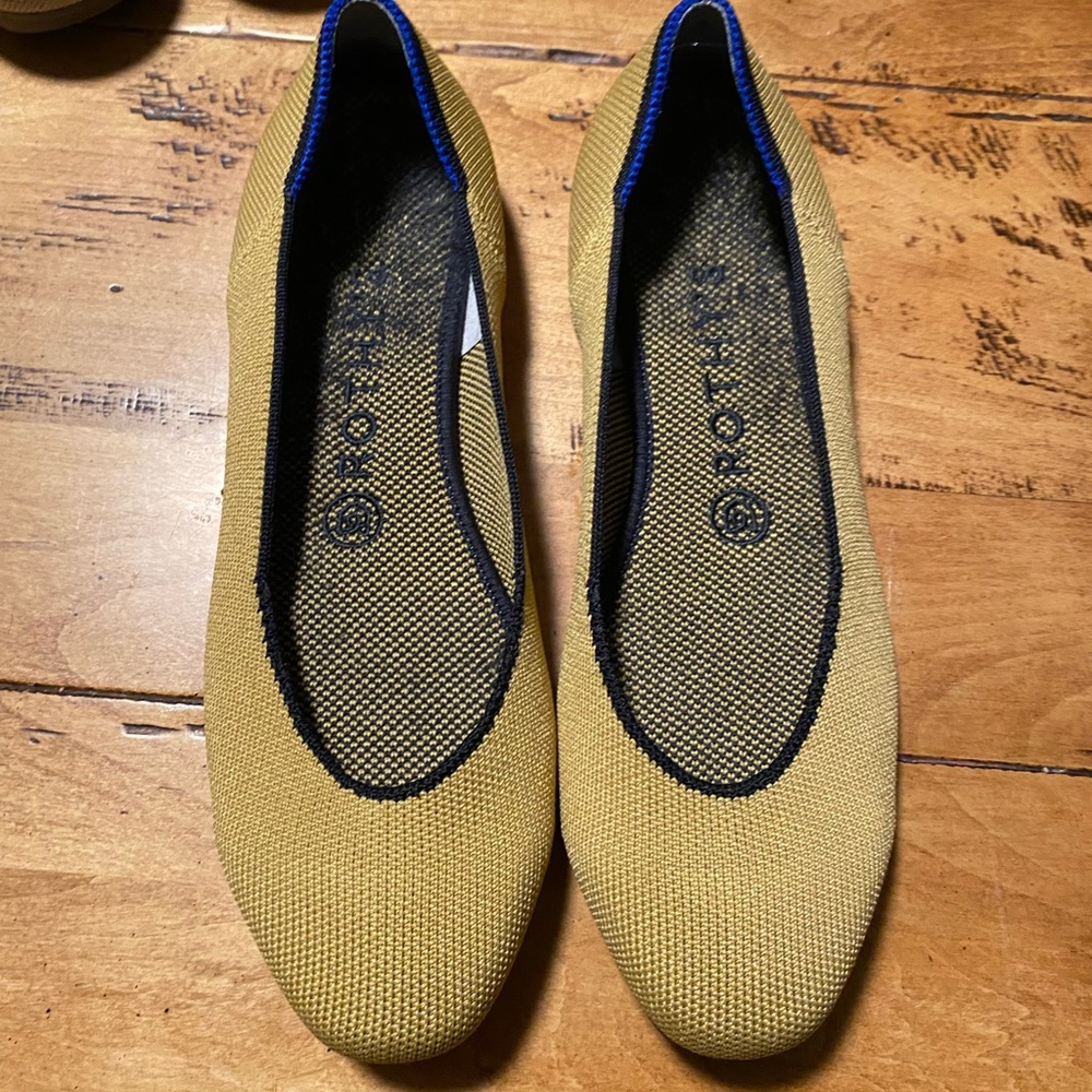 Rothy’s slip ons gold with blue 7.5
